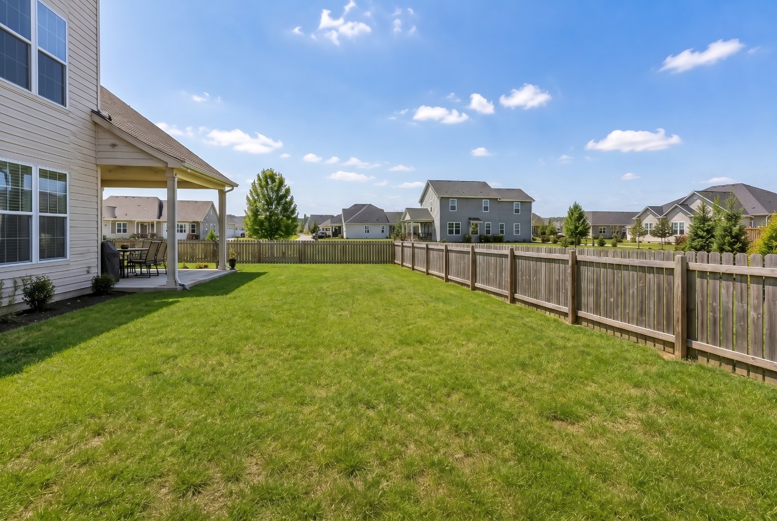 AI preview of the yard with a new fence installed